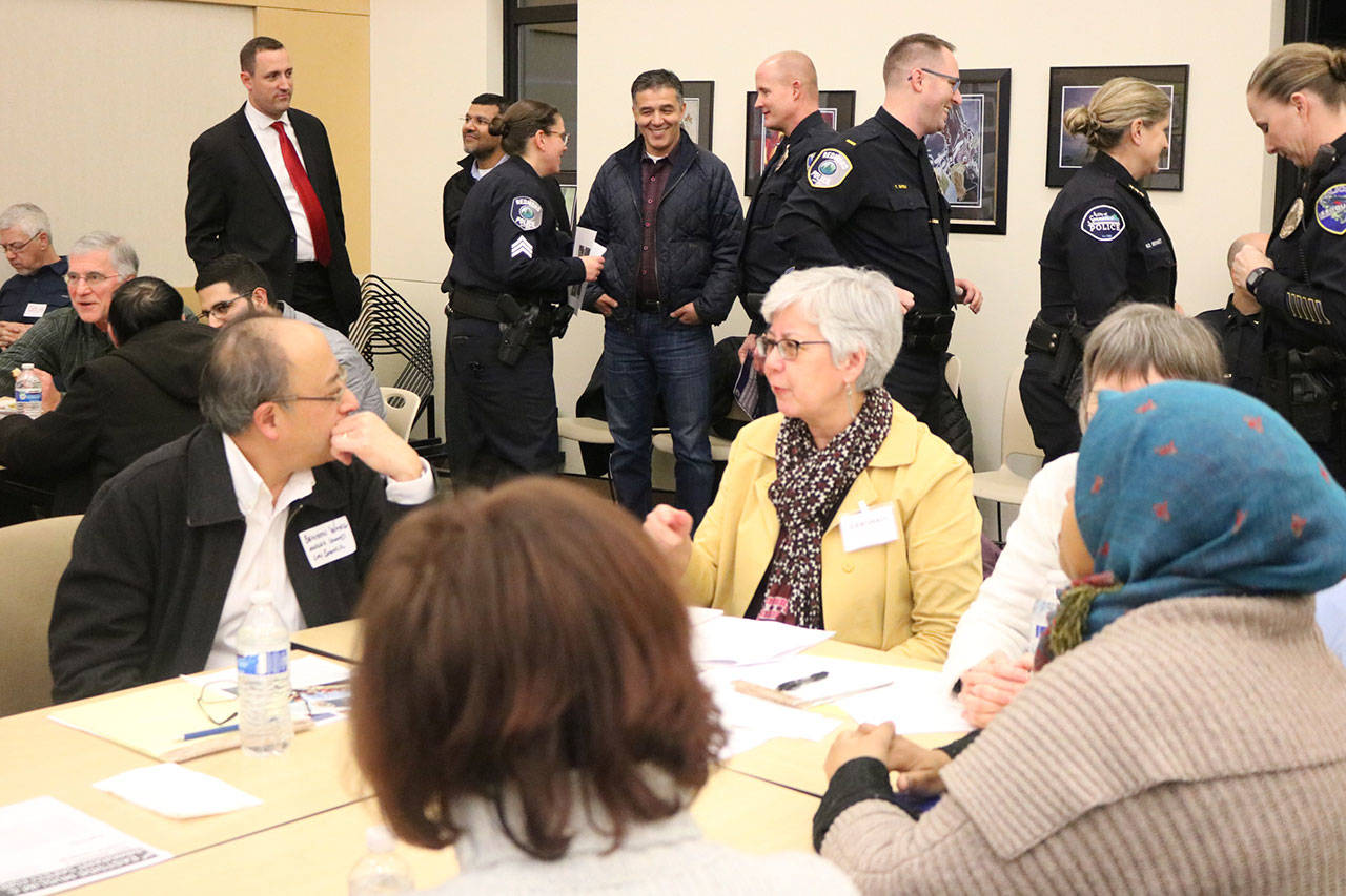 Left, Mercer Island City Councilmember Benson Wong discusses safety and cultural appreciation his fellow Eastside residents. Nicole Jennings/staff photo