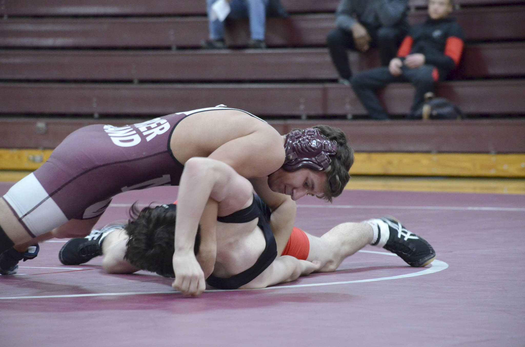 Photo courtesy of Billy Pruchno                                The Mercer Island Islanders wrestling squad cruised to a 48-0 victory against the Sammamish Totems on Jan. 5. Mercer Island 126-pounder Jordan Tillinger (pictured) pinned his opponent in the third round. Eli Pruchno (138), Vinny Ricci (152), and Rina Li (120) registered pins in their respective matches. Jonah Andrews (160), Liam Farrell (170), Donnie Howard (182) and Owen Babeler (195) won by forfeit.