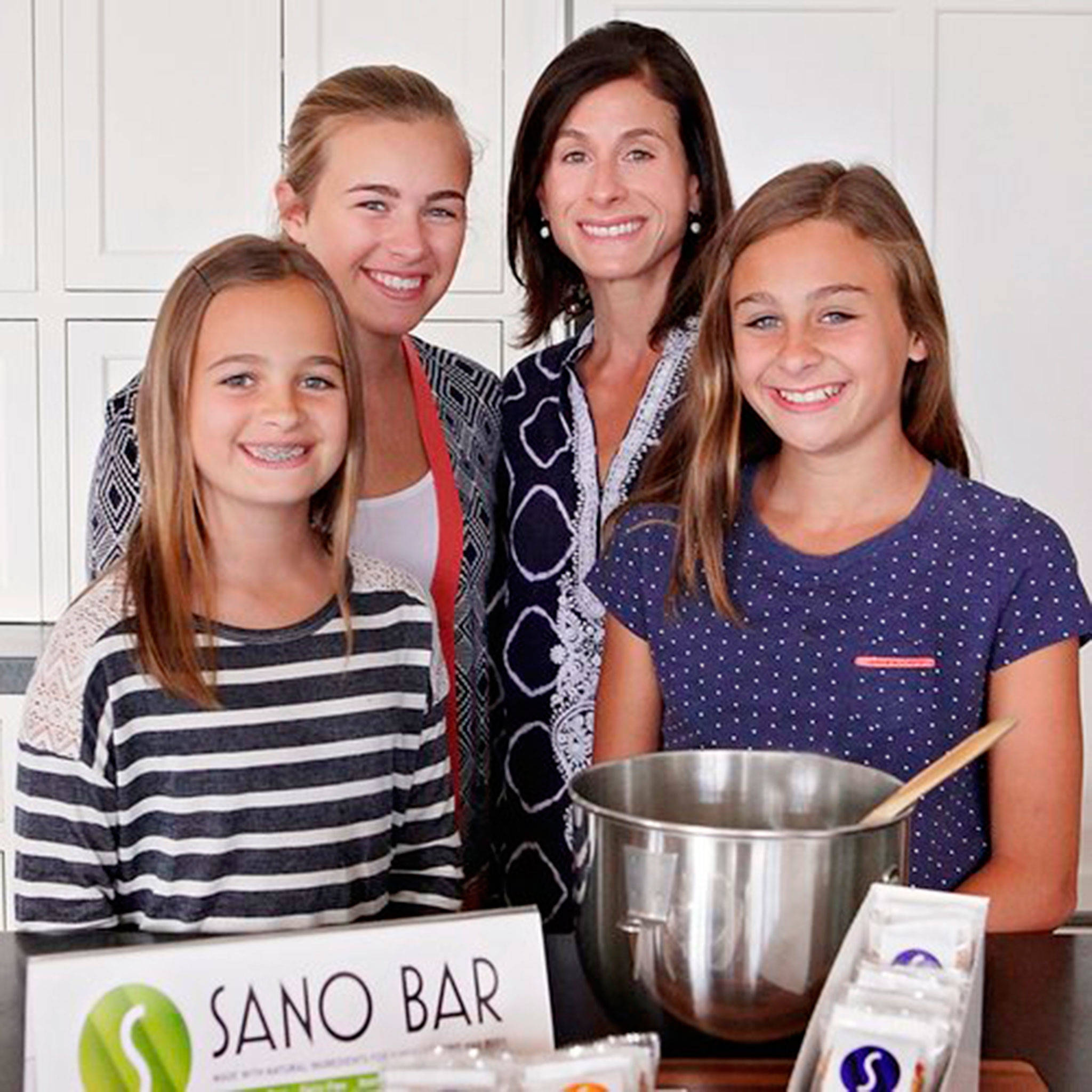 Lisa Nordstrom and her daughters created Sano Bar to provide a healthy snack option and give back by donating profits to local charities. Nordstrom says she hopes to sell the bars in her new Sano Cafe. Photo via thesanocafe.com