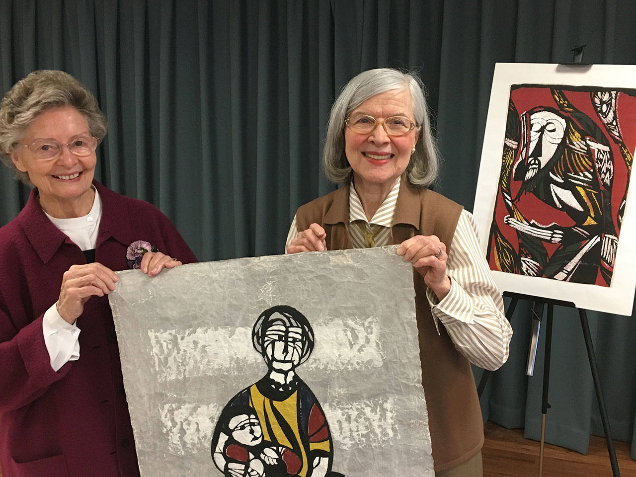 Nancy Exell, chair of the Covenant Shores Arts Commission, poses with Anne Pyle, the curator of the new exhibit opening soon at the Shores’ Lighthouse Gallery featuring the work of Sadao Watanabe. Photo courtesy of Greg Asimakoupoulos