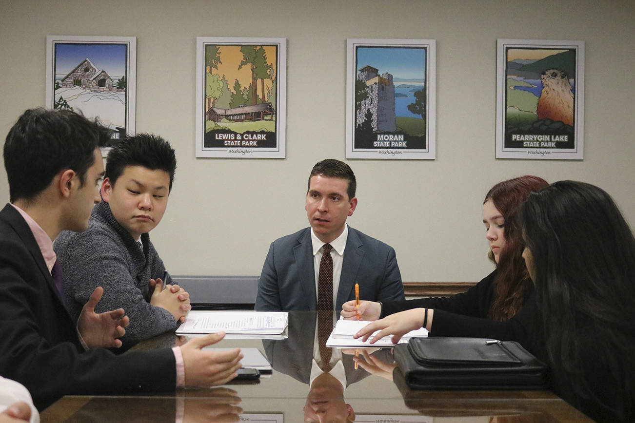 Rep. Paul Graves (R-Fall City), center, of the 5th District talks to Issaquah YODA students about the substance abuse problems they have seen on their campuses. Nicole Jennings/staff photo