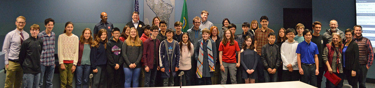 Joined by their teachers, the 46 All-State Musicians from Mercer Island High School and Islander Middle School were honored at the Jan. 25 School Board meeting. Photo courtesy of the Mercer Island School District