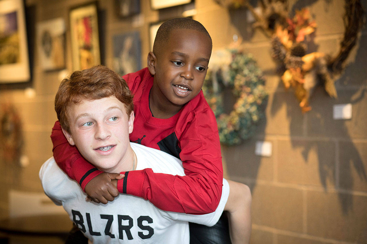 Volunteer David spends quality time with Maxwell during Sunday Circle. Courtesy photo