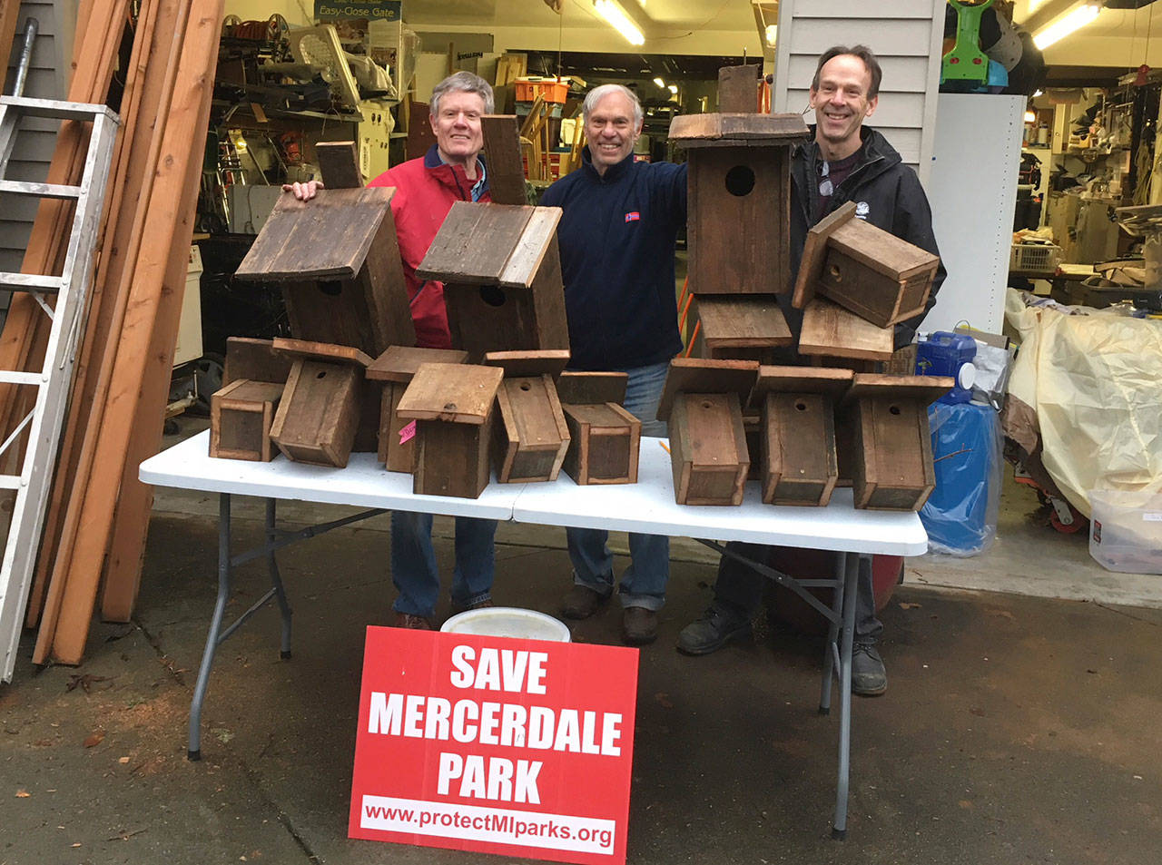 Members of Concerned Citizens for Mercer Island Parks with 21 birdhouses built out of recycled cedar, which will be mounted in the newly refurbished Native Garden in Mercerdale Park. Photo courtesy of Linda Anchondo