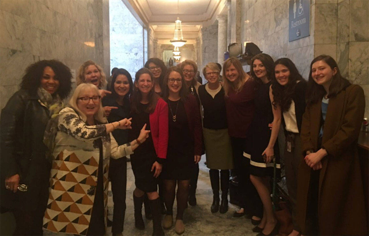 Rep. Tana Senn celebrates the passage of the Equal Pay Opportunity Act in Washington state. Photo via Twitter