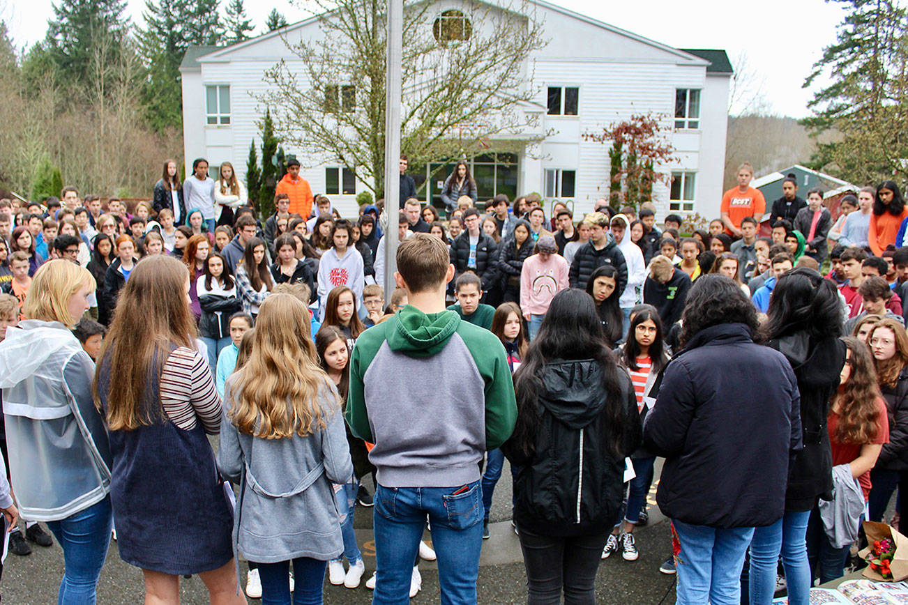 Overlake students participate in a walkout at the Redmond school, calling on legislators and Congress to enact “common sense” gun control laws. Photo courtesy of Susan Messier, The Overlake School