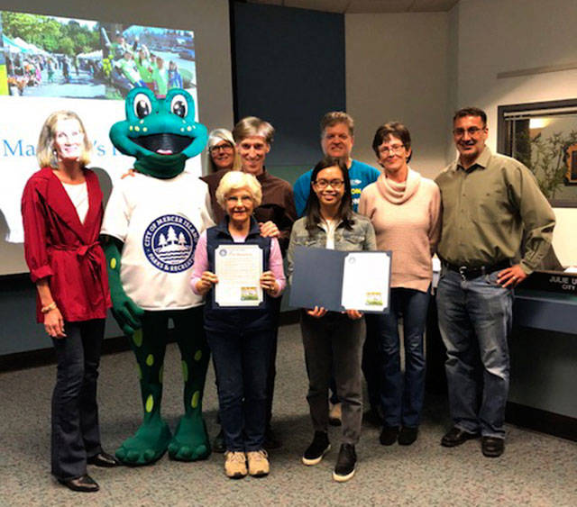 Mayor Debbie Bertlin, left, proclaims April 22 as Earth Day. Photo courtesy of the city of Mercer Island