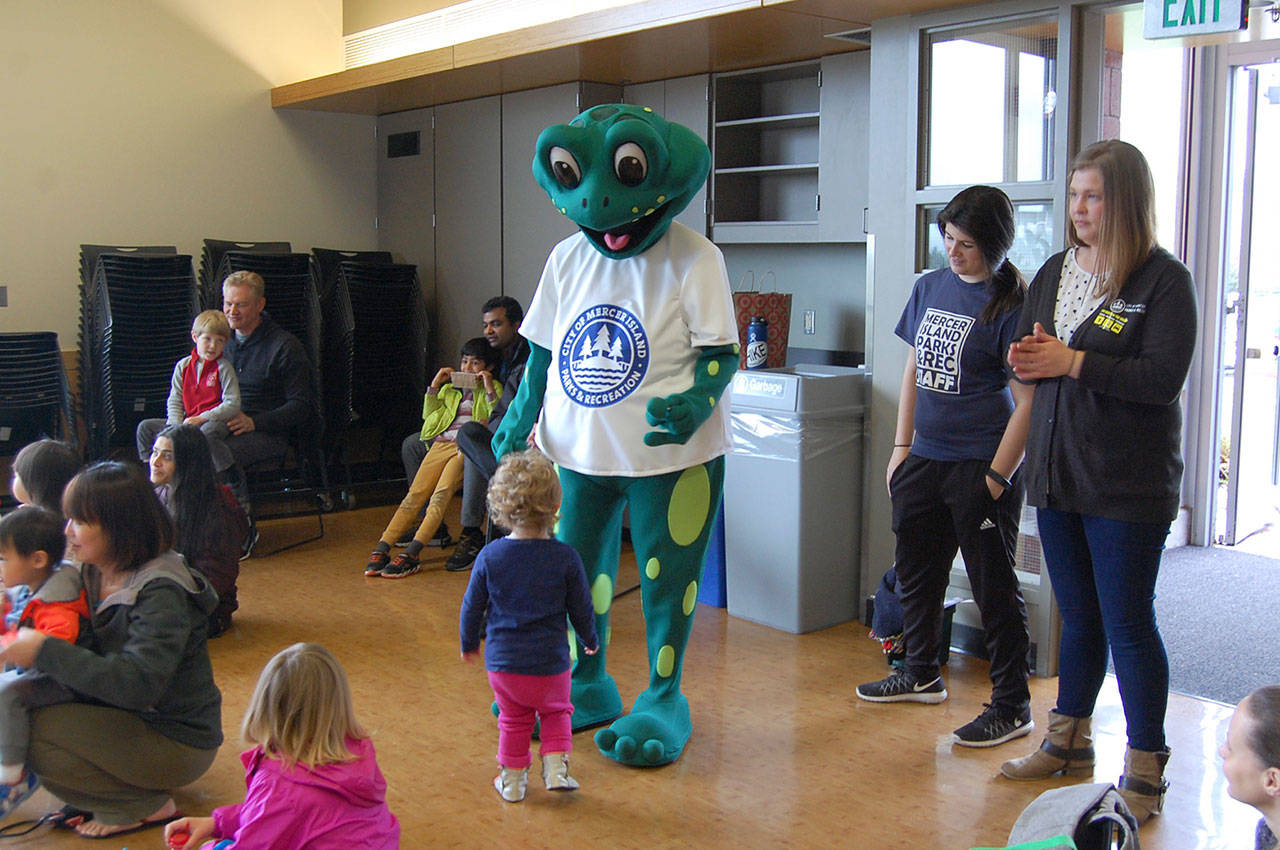 Leap, the mascot of Mercer Island’s sustainability fair, greets young residents at the event on April 14. Katie Metzger/staff photo