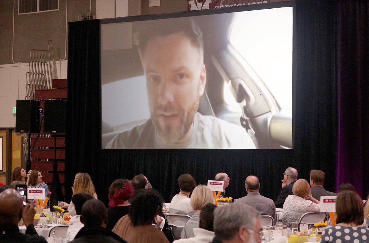 Joel McHale calls in to the breakfast to accept the award and talk about his time in the Mercer Island school system. Evan Pappas/Staff Photo