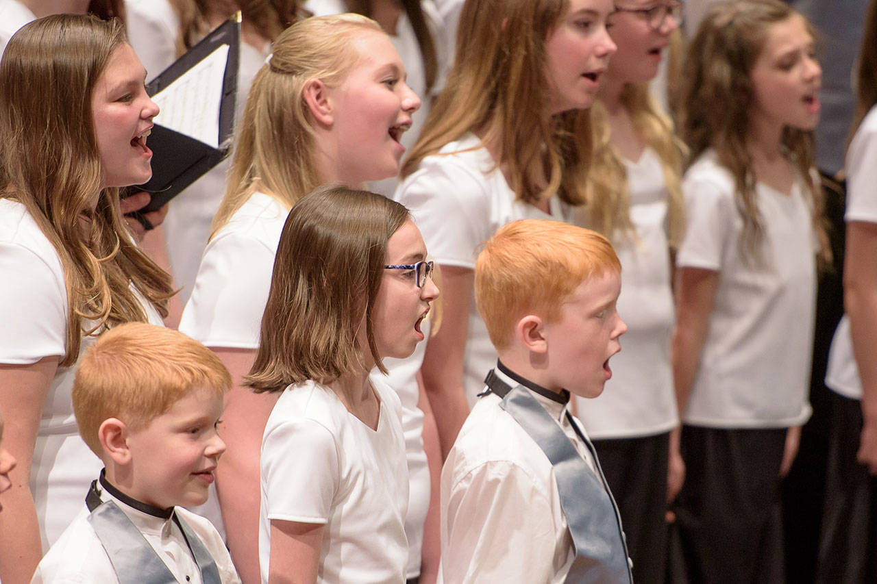The Ensign Youth Chorus sing with the Ensign Symphony & Choir which performs in Benaroya Hall. The choir will also sing at the prayer for peace event. Photo courtesy of the Mercer Island Church of Jesus Christ of Latter-Day Saints