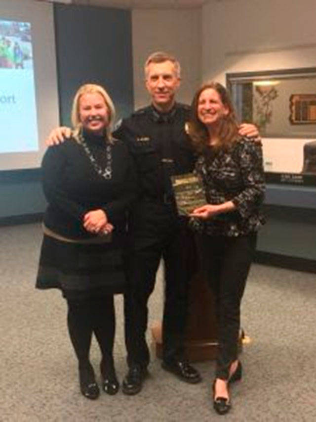 Rep. Tana Senn with Ed Holmes, Chief of the Mercer Island Police Department, and Erica Hallock, State Director of Fight Crime: Invest in Kids.