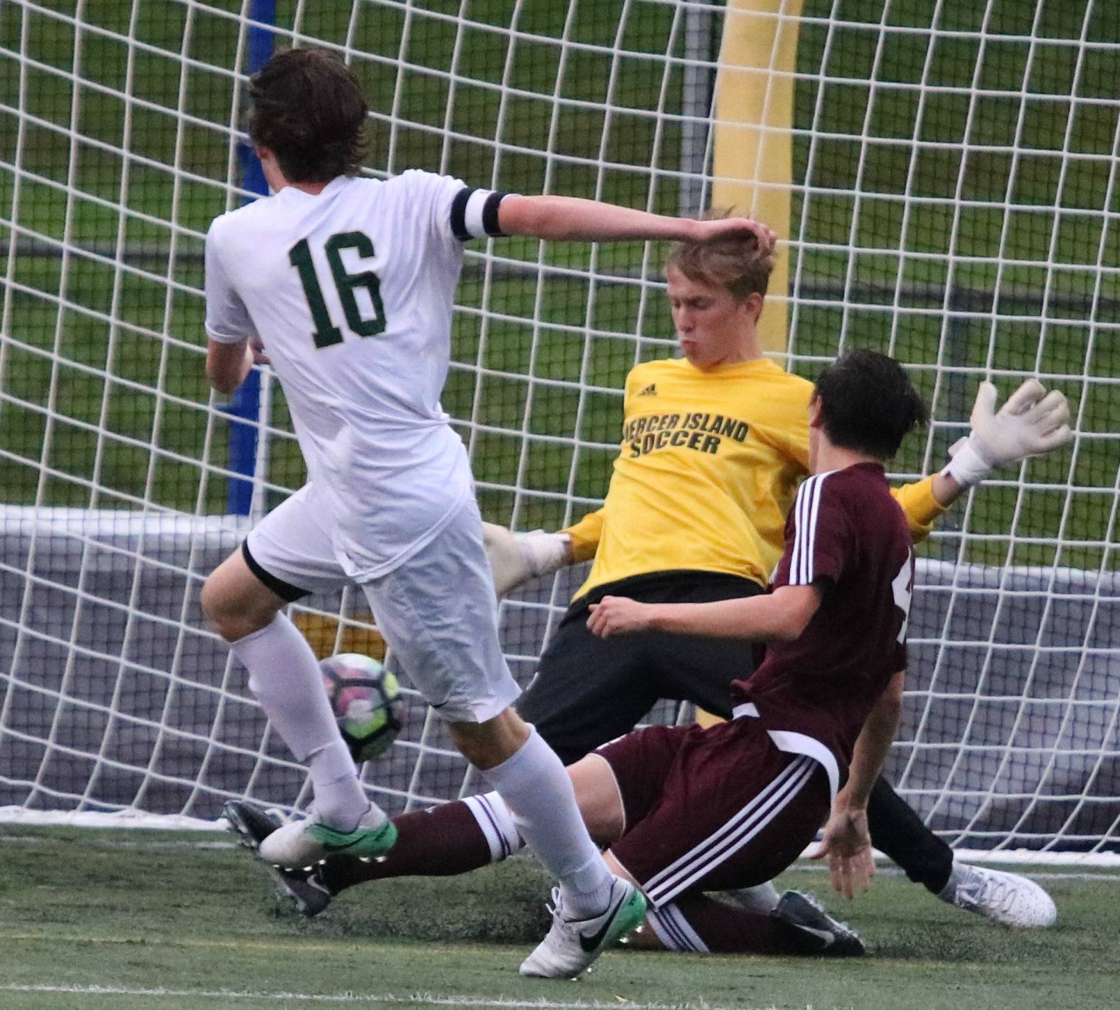 Mercer Island goalkeeper Adam Braman makes a save against Redmond on Tuesday night. Andy Nystrom / staff photo