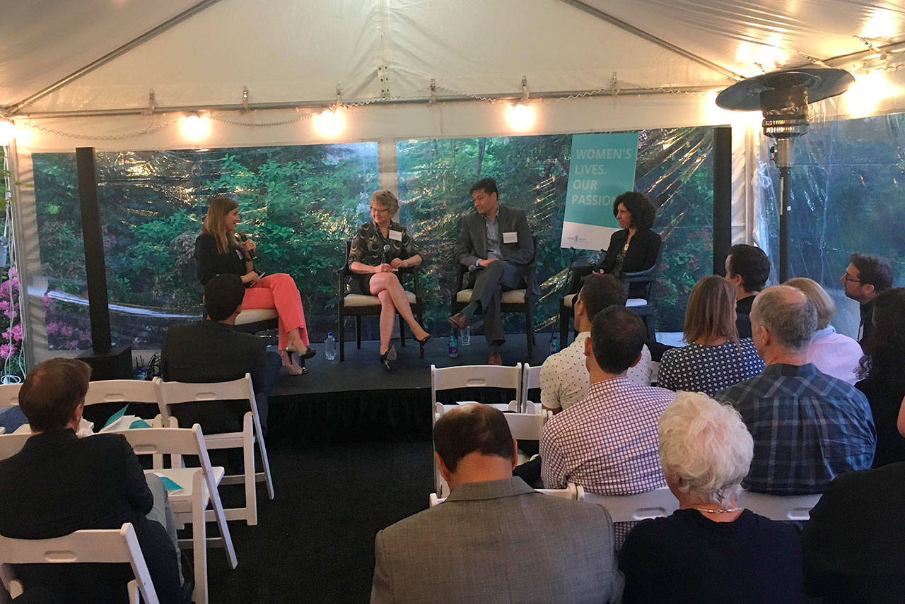 Kirsten Ward moderates a panel with research scientists Dr. Garnet Anderson, Dr. John Liao and Dr. Rosana Risques on Mercer Island on May 9 at an event for the Rivkin Center for Ovarian Cancer. Katie Metzger/staff photo