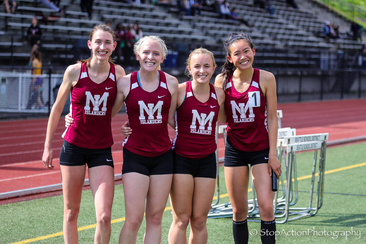 Photo courtesy of Don Borin/Stop Action Photography                                 The Mercer Island Islanders 800 relay squad consisting of Eliza Crenshaw, Maggie Baker, Kayla Lee and Gretchen Blohm captured first place with a time of 1:42.80 at the Class 3A District II track championships on May 18 at the Southwest Athletic Complex in Seattle. Ballard finished in second place with a time of 1:44.20.