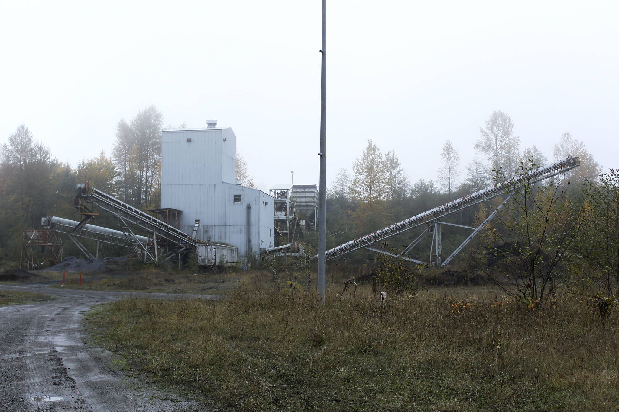 After the coal at the John Henry Mine is mined, the material is put through two crushers and separated — coal is put out on the right, while refuse exits to the left. Ray Still/Sound Publishing