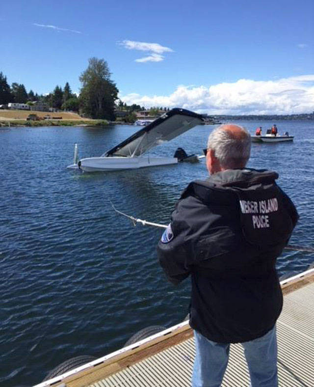Mercer Island Marine Patrol 14 helped secured a crashed seaplane to a dock in Renton on June 10. Photo via Facebook