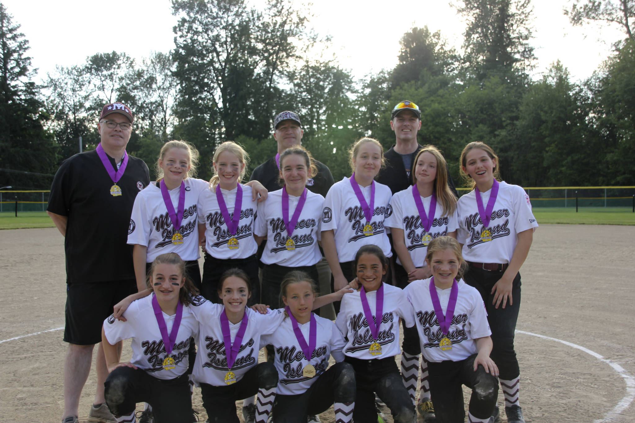 The Mercer Island Little League softball all-star majors team, which is comprised of players between 11-12 years of age, competed in the Little League Softball Division Washington District 9 all-star tournament from June 19-21 in Duvall. The MILL all-stars had an overall record of 1-2 at the tournament. They registered a win against Bellevue but suffered losses to Kirkland and Redmond.                                Members of the team included Annabel Little, Grace Cartwright, Joey Lurie, Poppy Walker, Ashlyn Powell, Katherine Montpellier, Sophia Pacecca, Neve Kelley, Shannon Rogan, Erica Kierstead and Addie Bergman. The team was coached by Kevin Kelley (head coach) and assistants Paul Rogan and Allan Montpellier. Photo courtesy of Cindi Pacecca
