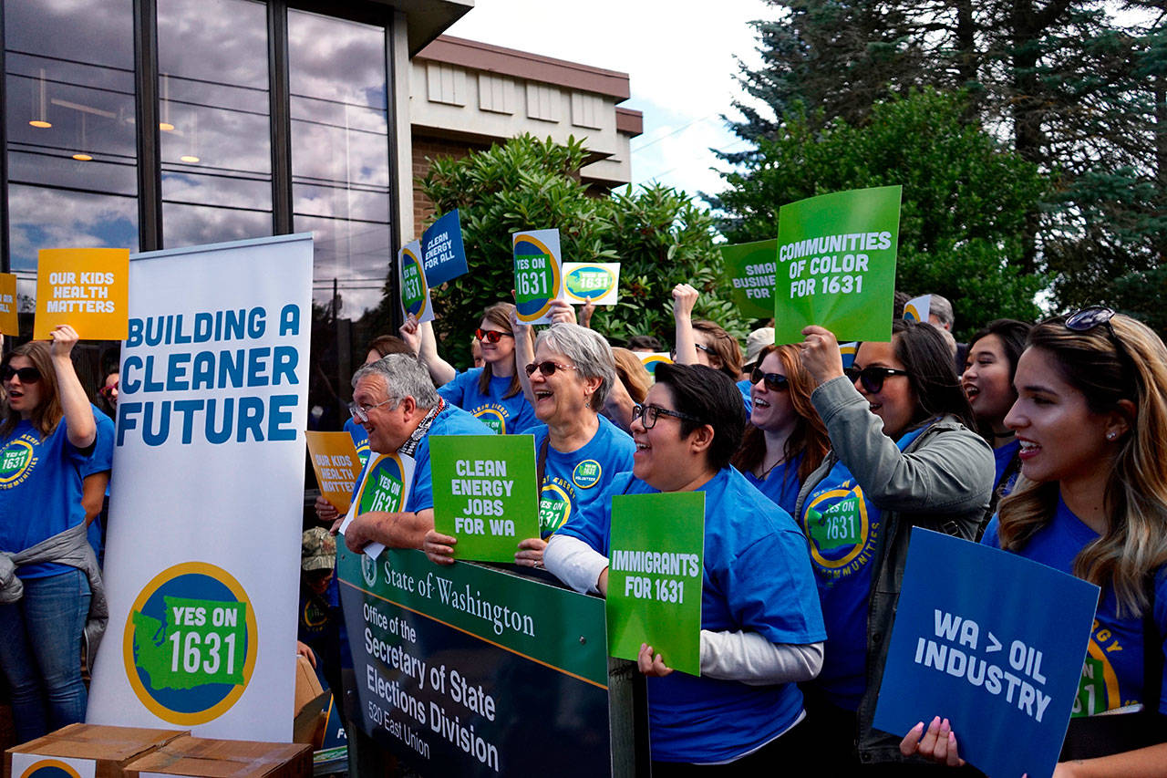 Activists rallied in support of I-1631 in Olympia on July 2. The Yes On I-1631 campaign collected roughly 100,000 more signatures than needed to place the initiative on the November ballot. Photo contributed by Yes On I-1631.