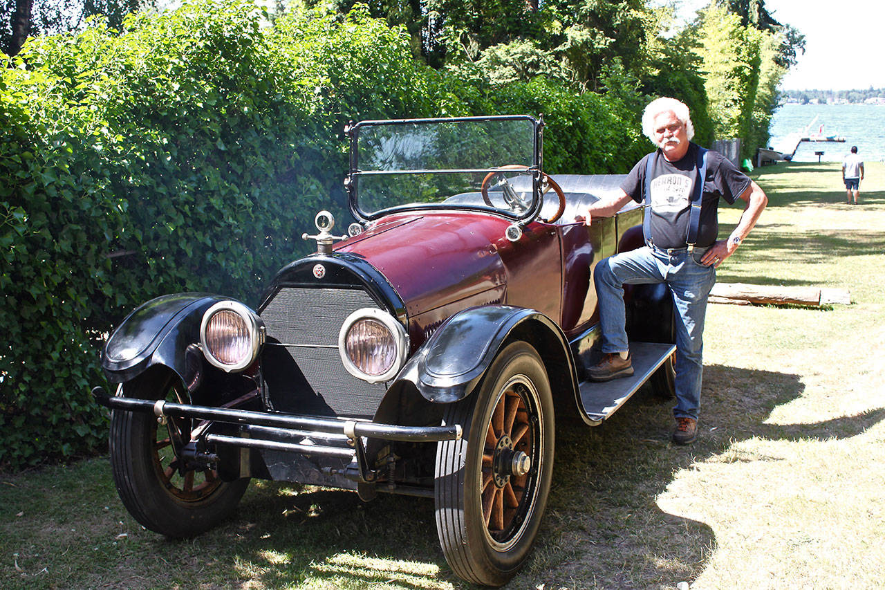 Islander Steve Hearon poses with his 1918 Cadillac, which he bought and restored. To celebrate its 100th birthday, the car will be featured in the Summer Celebration parade and Mercer Island Car Show on July 14-15. Photo courtesy of Tom Alberts