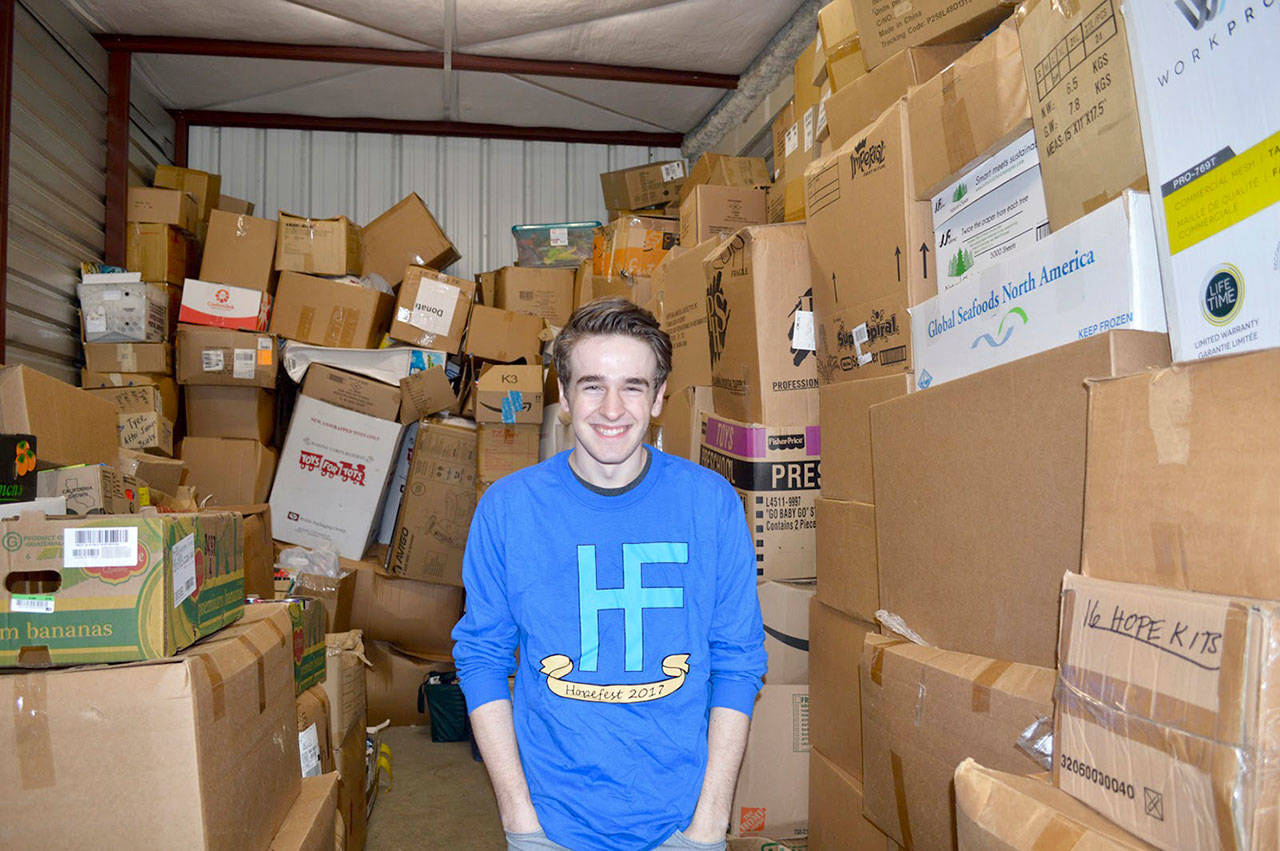 Tyler Zangaglia, one of the founders of HopeFest, at their storage unit filled with supplies for the festival on March 3. Alize Asplund/UW News Lab