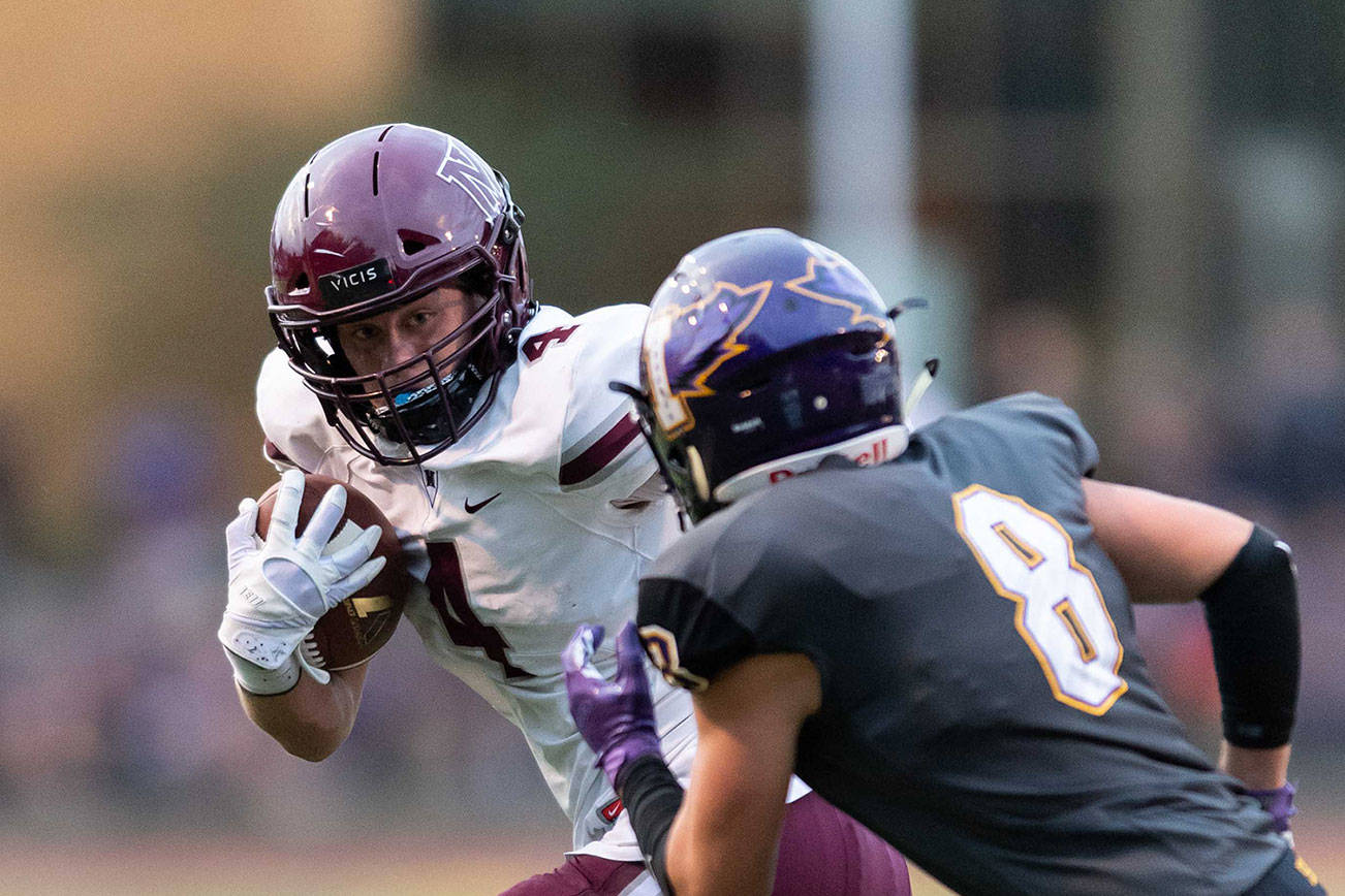 Mercer Island senior running back Jack Clayville (pictured) has been one of the most prolific players on offense for his team throughout the 2018 season thus far. The Islanders have compiled an overall record of 5-0 in early season action. Photo courtesy of Patrick Krohn/Patrick Krohn Photography