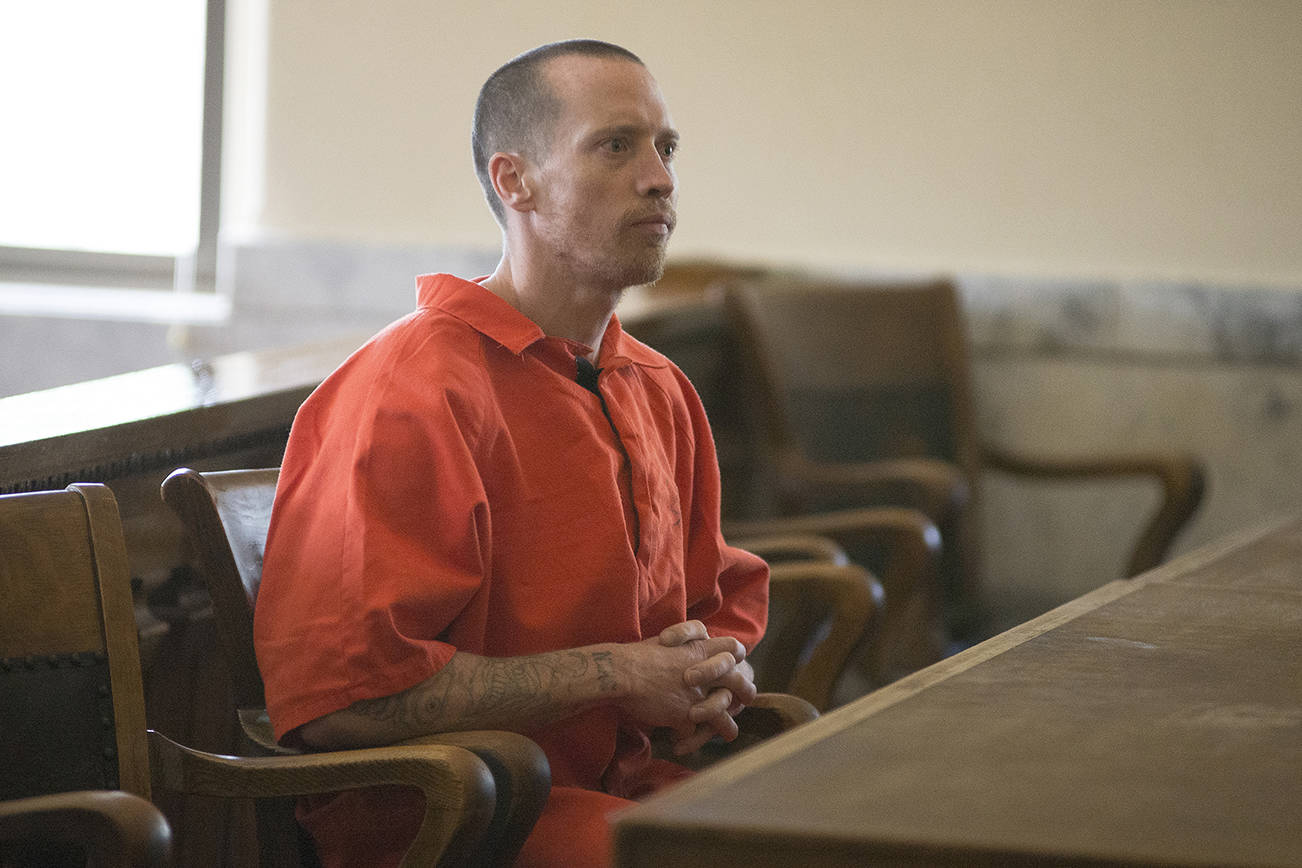 (Aaron Lavinsky | The Daily World) Brian Basset listens in during a preliminary hearing in Grays Harbor County Superior Court on Monday, June 16, 2014 in Montesano. The court is in the process of setting a new minimum term for Bassett in the wake of a U.S. Supreme Court ruling.