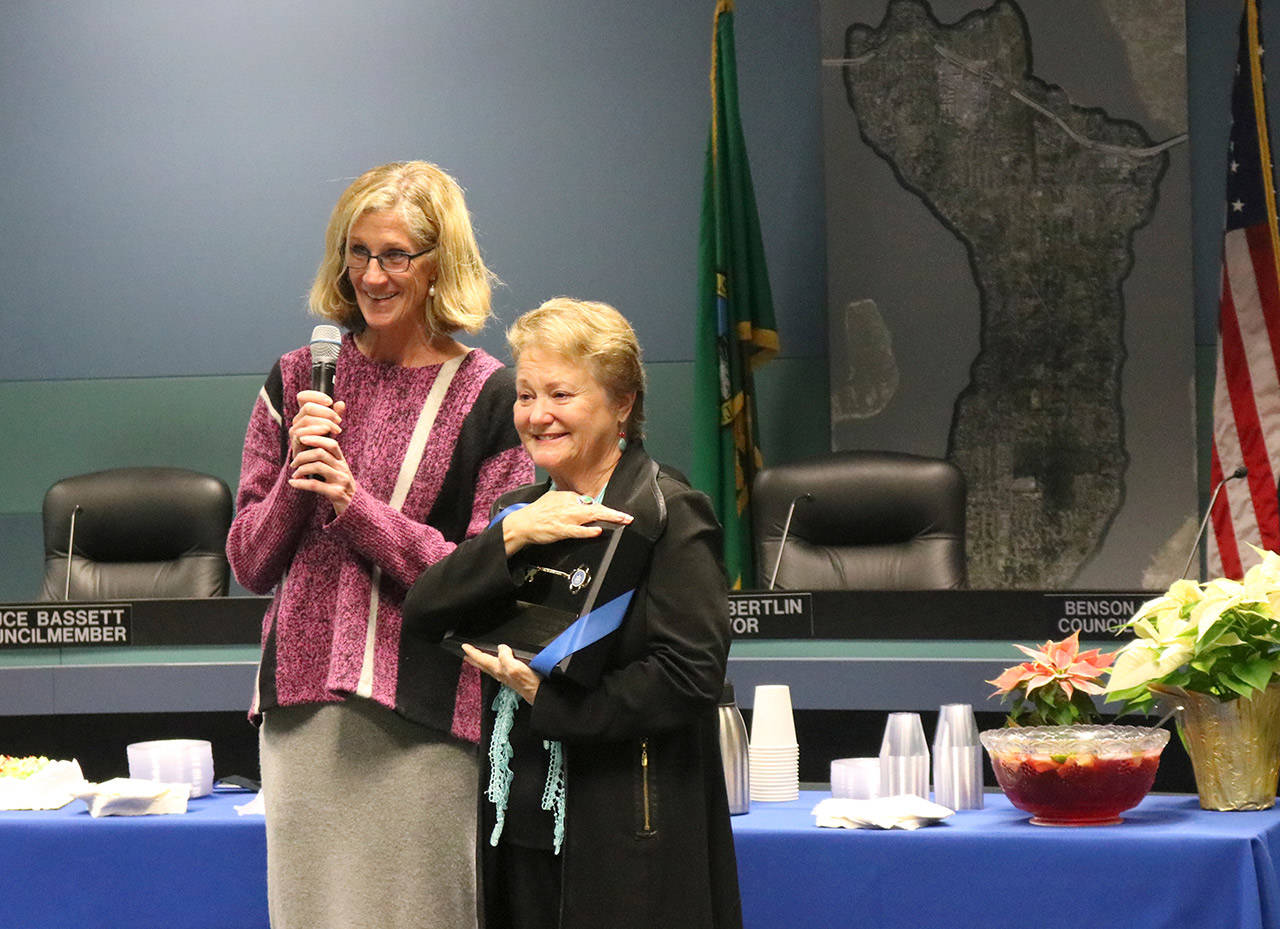 Retiring Rep. Judy Clibborn receives the first ‘key to the city’ from Mercer Island Mayor Debbie Bertlin. Katie Metzger/staff photo