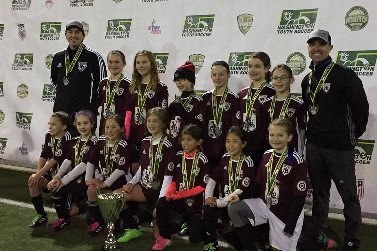 The Mercer Island Flames U-11 girls soccer team won the Washington Youth Soccer Regional Recreational Cup on Dec. 2. The Flames finished the 2018 season with an undefeated record of 16-0. Members of the Flame roster included Sophia Kinkead, Sabina Leveque, Scout Bates, Quincey Eskridge, Ciela Turner, Ashlyn Belden, Avery Oliver, Mia Sung, Chloe Mar, Bryanna Denmarsh, Amelie Swift, Gianna Tubach, Elianna Weiss and Cate Thomas. The team was coached by David Tubach, Adam Kinkead and Scott Weiss. Photo courtesy of David Tubach