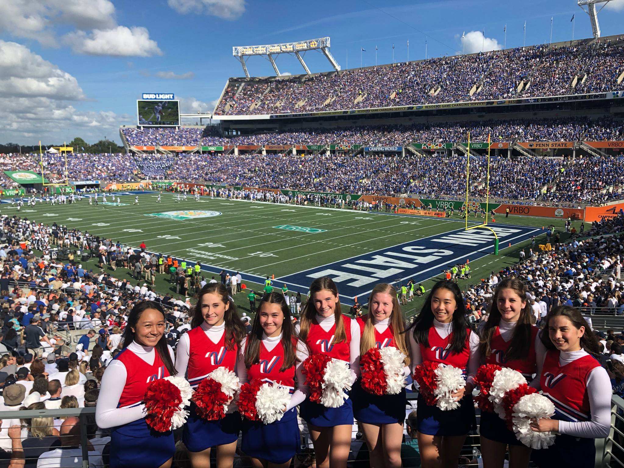 Mercer Island cheerleaders (from left) Ella Simpson, Julia Chorak, Carys Ciobanu, Hannah Hobson, Stella Prophater, Lauren Nguyen, Julia Brondello and Kayla Friedman pose for a photo on Jan. 1 at the Citrus Bowl in Orlando, Fla. Photo courtesy of coach Alex Schwenke