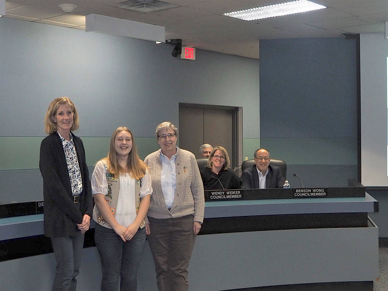 The Mercer Island City Council honored Kari Anderson (center) for earning the Girl Scout Gold Award at a council meeting in 2018. Also pictured is Jennifer Wright, MISD executive director of Learning Services (right) and Mayor Debbie Bertlin. Photo courtesy of Janet Piehl/Girl Scout Leader Troop 43142.