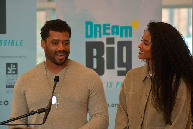 Russell Wilson and Ciara spoke Friday at the Tukwila Library to Foster students and other attendees as their Why Not You Foundation joined forces with the King County Library System and JPMorgan Chase to launch the DREAM BIG: Anything is Possible campaign. Photo by Kayse Angel