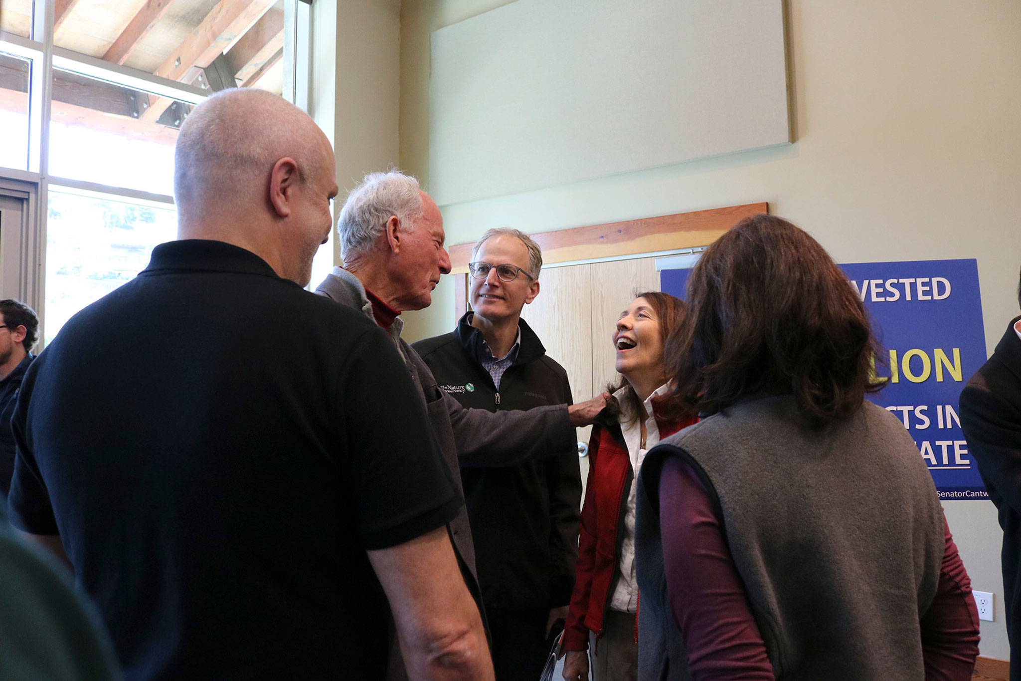 Sen. Maria Cantwell mingles with supporters after her rally on Feb. 21, including Jim Whittaker, the first American to ascend Mt. Everest. Katie Metzger/staff photo