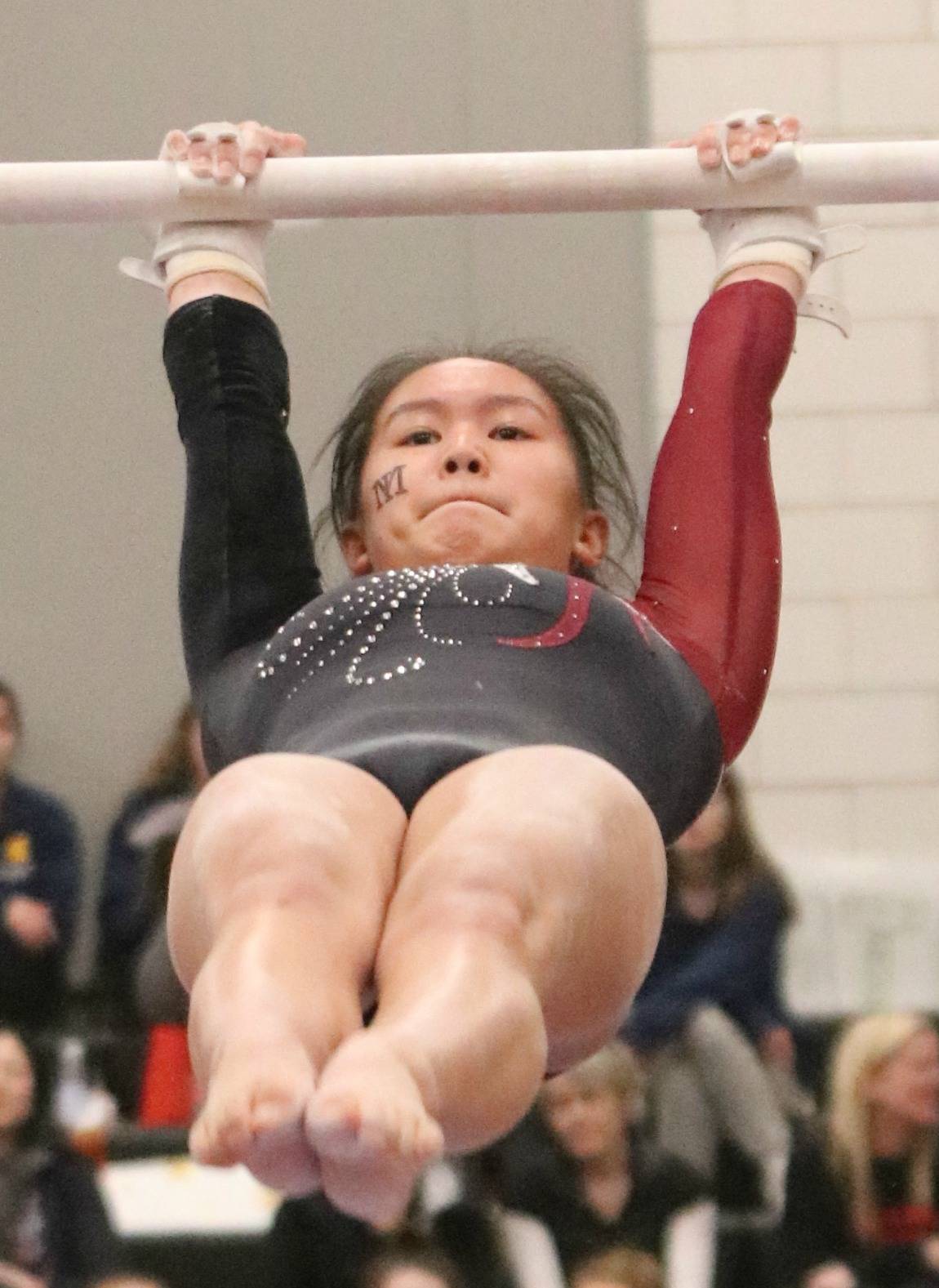 Mercer Island’s Rachel Ressmeyer tied for 11th on bars at the 1A/2A/3A state gymnastics championships at Sammamish High on Feb. 22. She scored a 9.1 on the event. Ava Motroni and Emery Sampson also competed for the Islanders. Andy Nystrom / staff photo