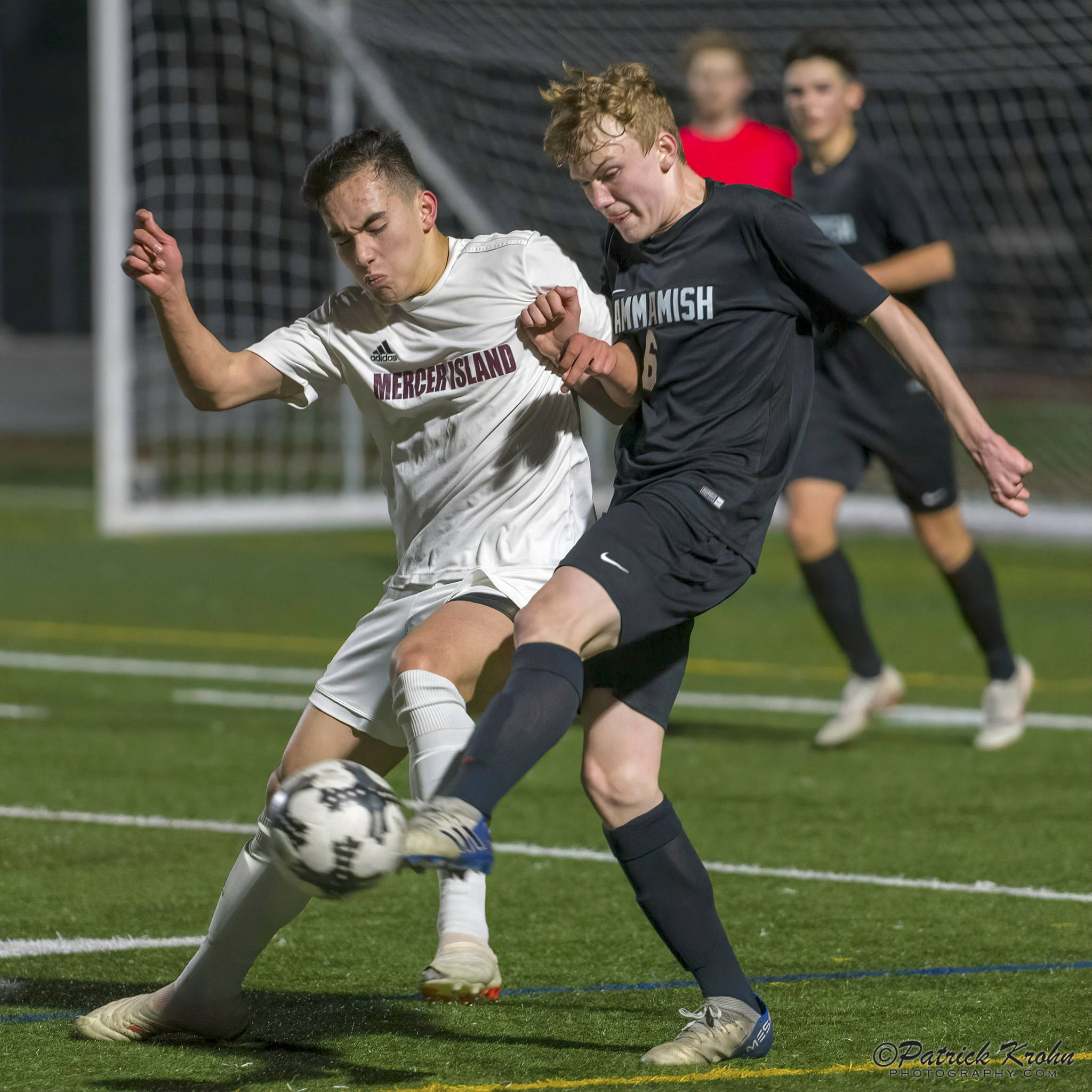 Mercer Island senior forward Dakota Promet, left, and Sammamish freshman Andrew Wilbert, right, battle for possession of the ball on March 26 at Sammamish High School in Bellevue. Mercer Island defeated Sammamish 1-0. Photo courtesy of Patrick Krohn/Patrick Krohn Photography