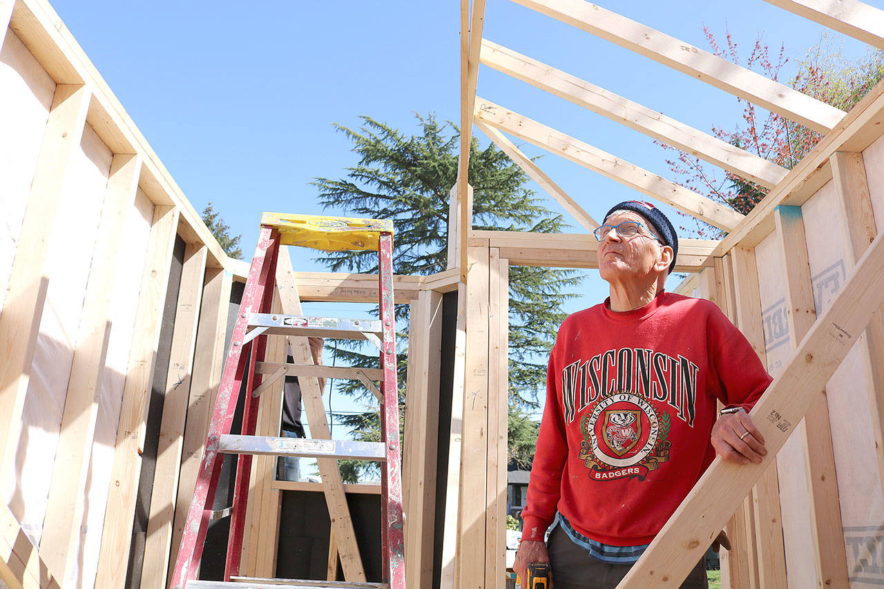 Stephanie Quiroz/staff photo                                 Tom Kofler helps build the tiny house at Mercer Island United Methodist Church.