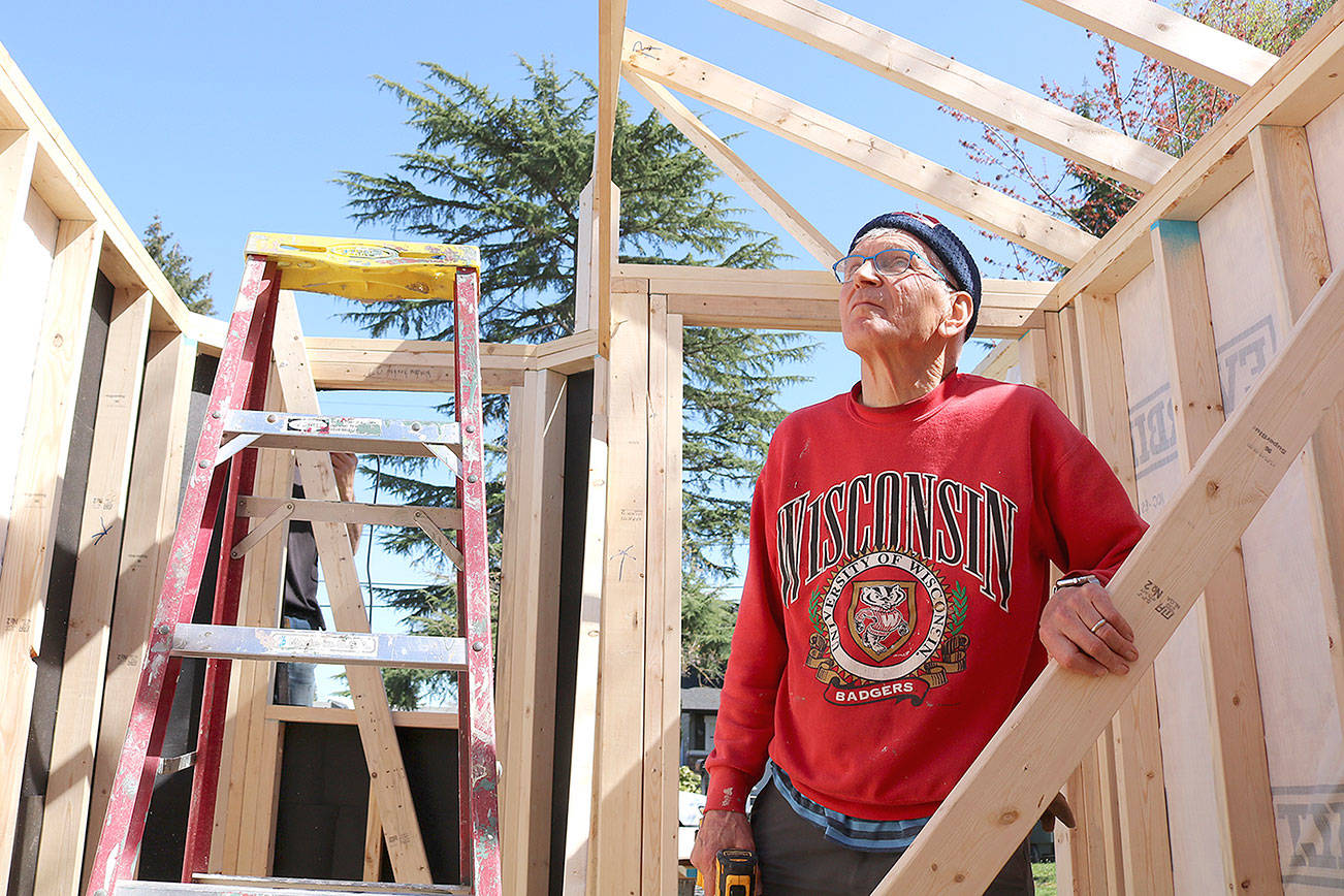 Stephanie Quiroz/staff photo                                 Tom Kofler helps build the tiny house at Mercer Island United Methodist Church.