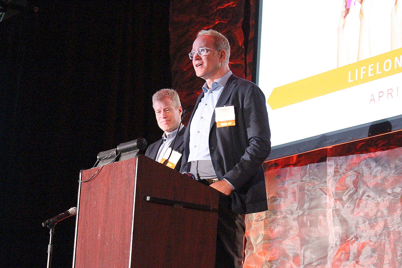 Erik and Pete nordstrom receive Pathfinder awards at the 15th annual Breakfast of Champions fundraiser. Madison Miller / staff photo