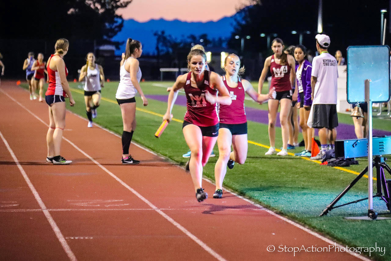 The Mercer Island Islanders girls 1600 relay team consisting of athletes Maggie Baker, Maya Virdell, Gretchen Blohm and Ashley Rudd, earned first place with a time of 4:07.66 at the 3A KingCo track championships in Kirkland. Photo courtesy of Don Borin/Stop Action Photography