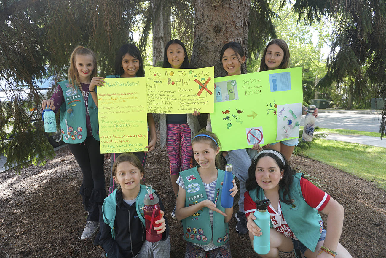 Fifth-grade Girl Scout Troop 41868 recently completed the Bronze Award project which focused on educating classmates on the environmental harm done by disposable plastic water bottles, and encouraging the use of reusable bottles. (Pictured clockwise from top-left) Lily Harper, Chloe Su, Selina Zhao, Alice Zhu, Ella Sirkis, Maya Talby, Savanna Rousell and Mika Salomon. Photo courtesy of Patrice Rousell