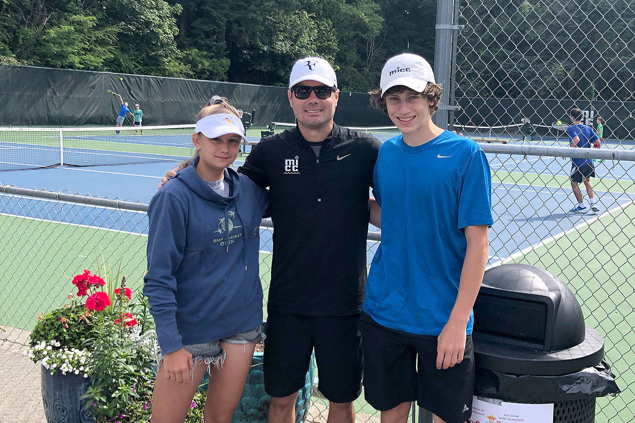 From left: middle schooler Valeriya Alekseykina, coach Jesse Walter, and Andrew Kaelin at the X-Out Cancer Fundraiser Jr. Tournament during the month of June. The team helped raise nearly $1658 which will help aid cancer families at Seattle Children’s. Courtesy photo of Gerry Kaelin