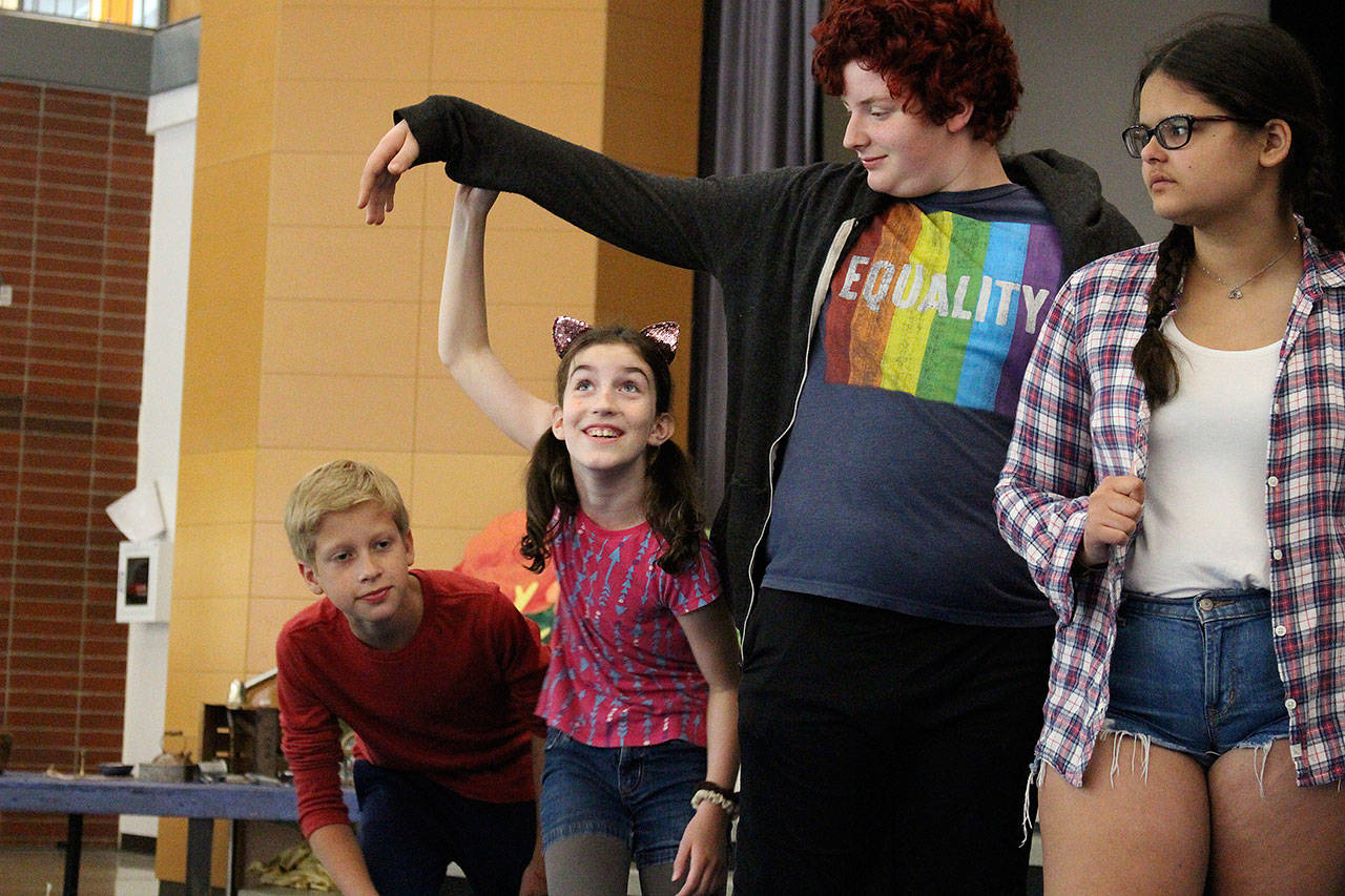 Cast members rehearse for YTNs production of The Monkey King. From left: Julian Podzilni, Nora Jorgensen, Sam Lamperti, and Abby Gamache. Madison Miller / staff photo