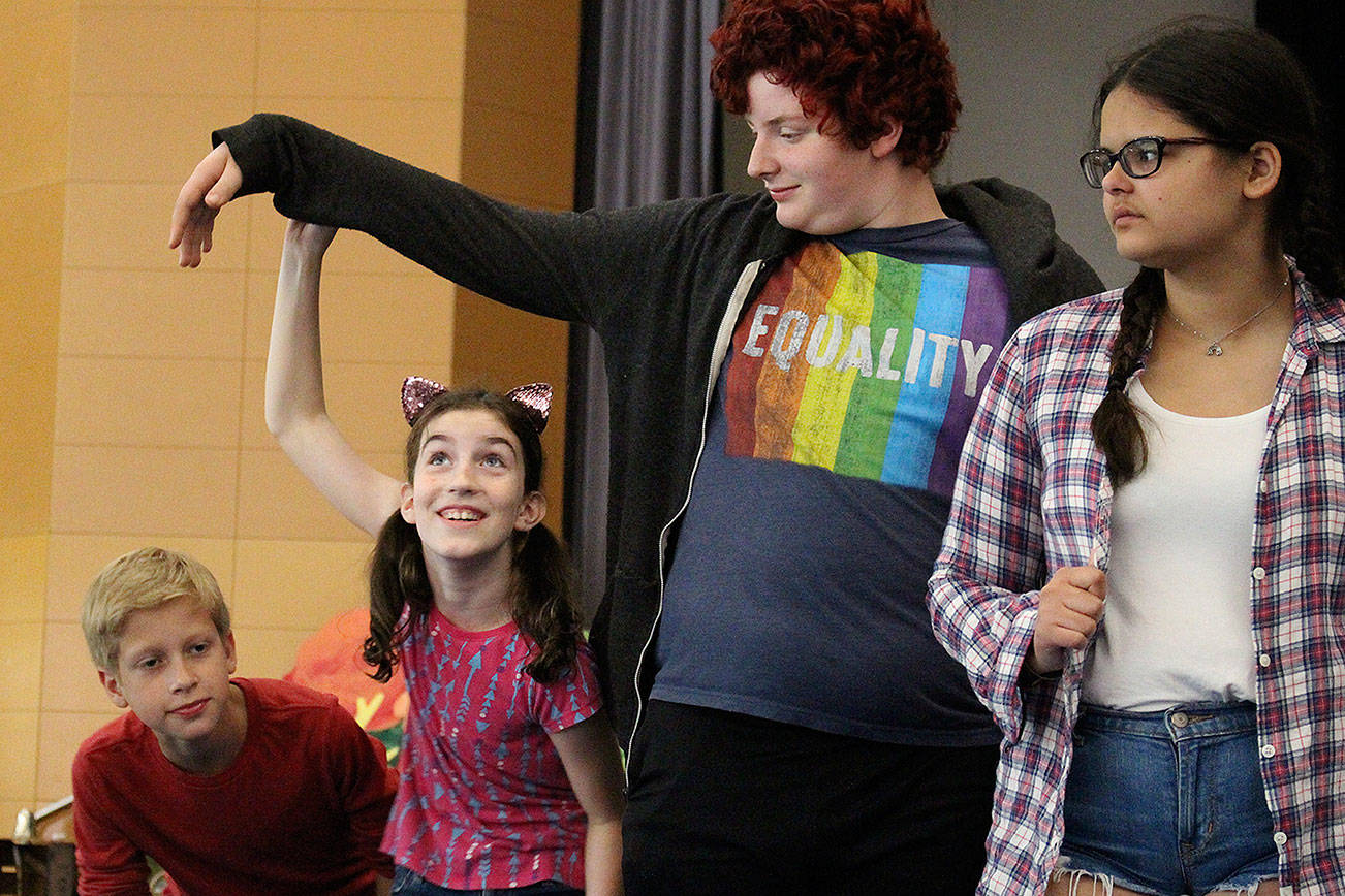 Cast members rehearse for YTNs production of The Monkey King. From left: Julian Podzilni, Nora Jorgensen, Sam Lamperti, and Abby Gamache. Madison Miller / staff photo