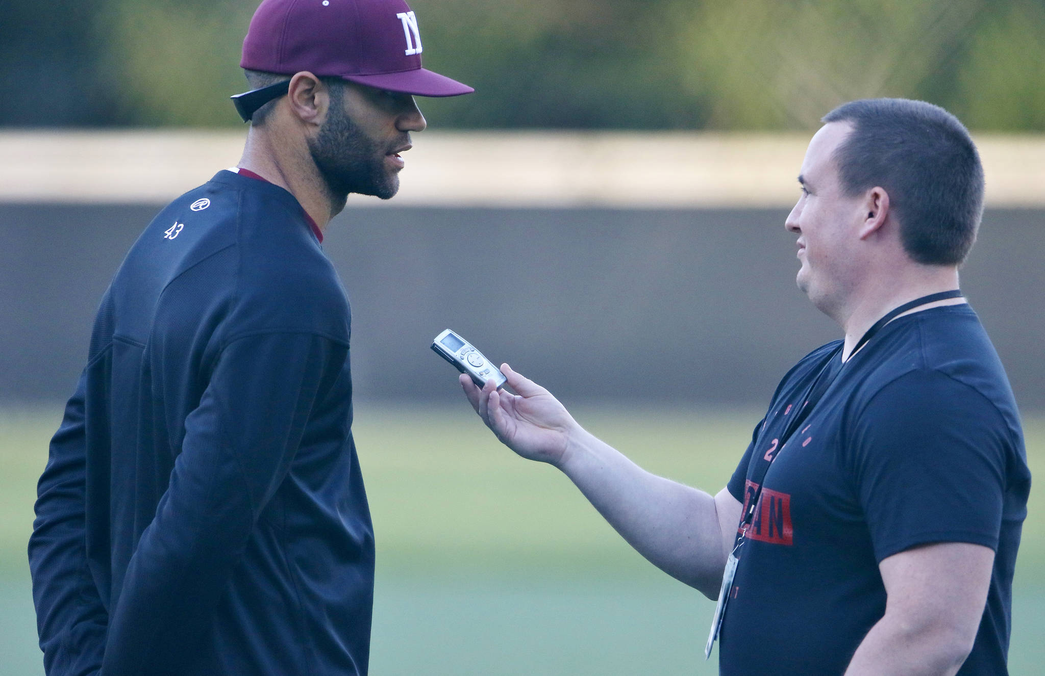 Sound Publishing sportswriter Shaun Scott, right, interviews Dominic Woody following a game against the Interlake Saints in April of 2019. Scott will be leaving Sound Publishing after 59 months on the job. Photo courtesy of Jim Nicholson