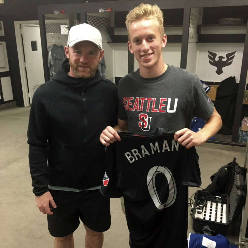 Mercer Island High School 2019 graduate Adam Braman, right, poses for a picture with professional soccer player Wayne Rooney earlier this year. Braman earned the Steve Newman Spirit award in 2019. Photo courtesy of Adam Braman