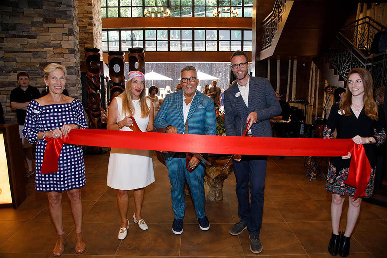 The ribbon cutting for Aegis Living took place in Mercer Island on July 20. Left to right: Mary Van Orman, Terese Clark, Dwayne Clark, Phil Clough and Stephanie Bayne. Photo courtesy of Aegis Living.                                 Aegis Living is a 100,000 square foot building with 89 apartment homes. Photo courtesy of Aegis Living.