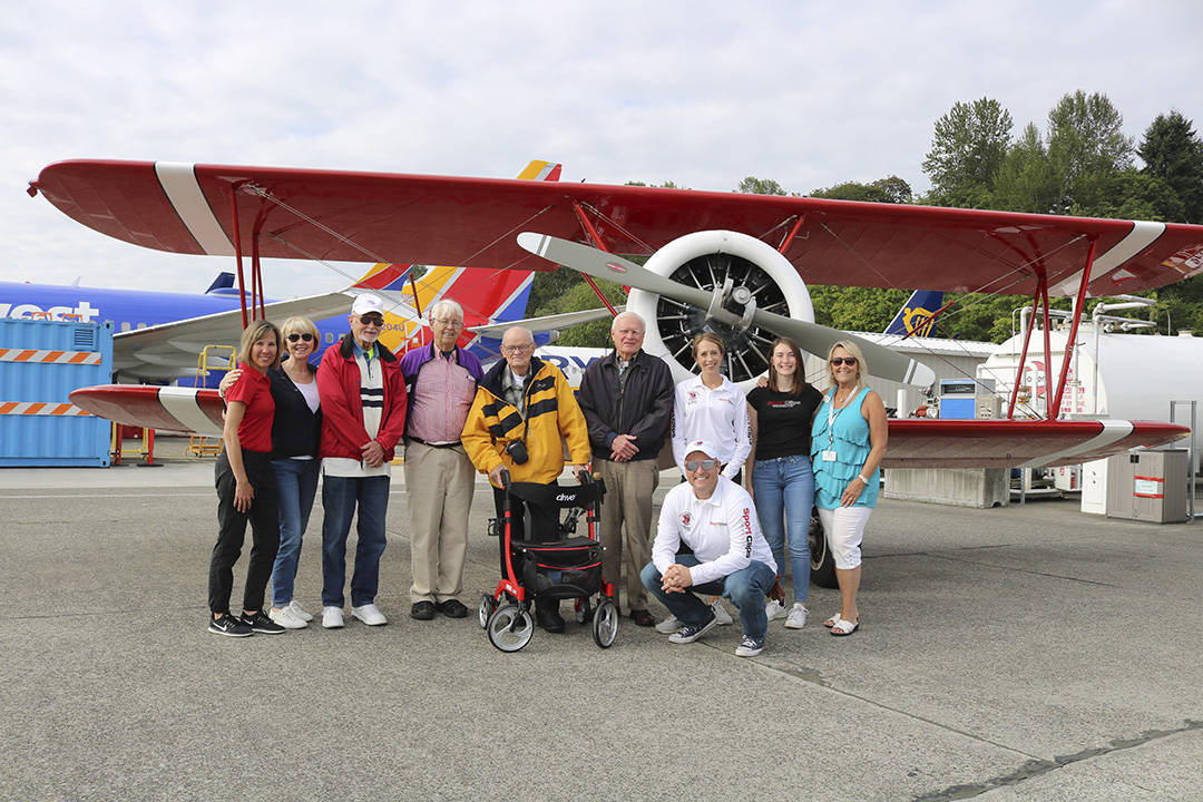 Stephanie Quiroz/staff photos                                Covenant Living at the Shores residents and staff with Ageless Aviation pilot and team at the Renton Municipal Airport on Aug. 12.