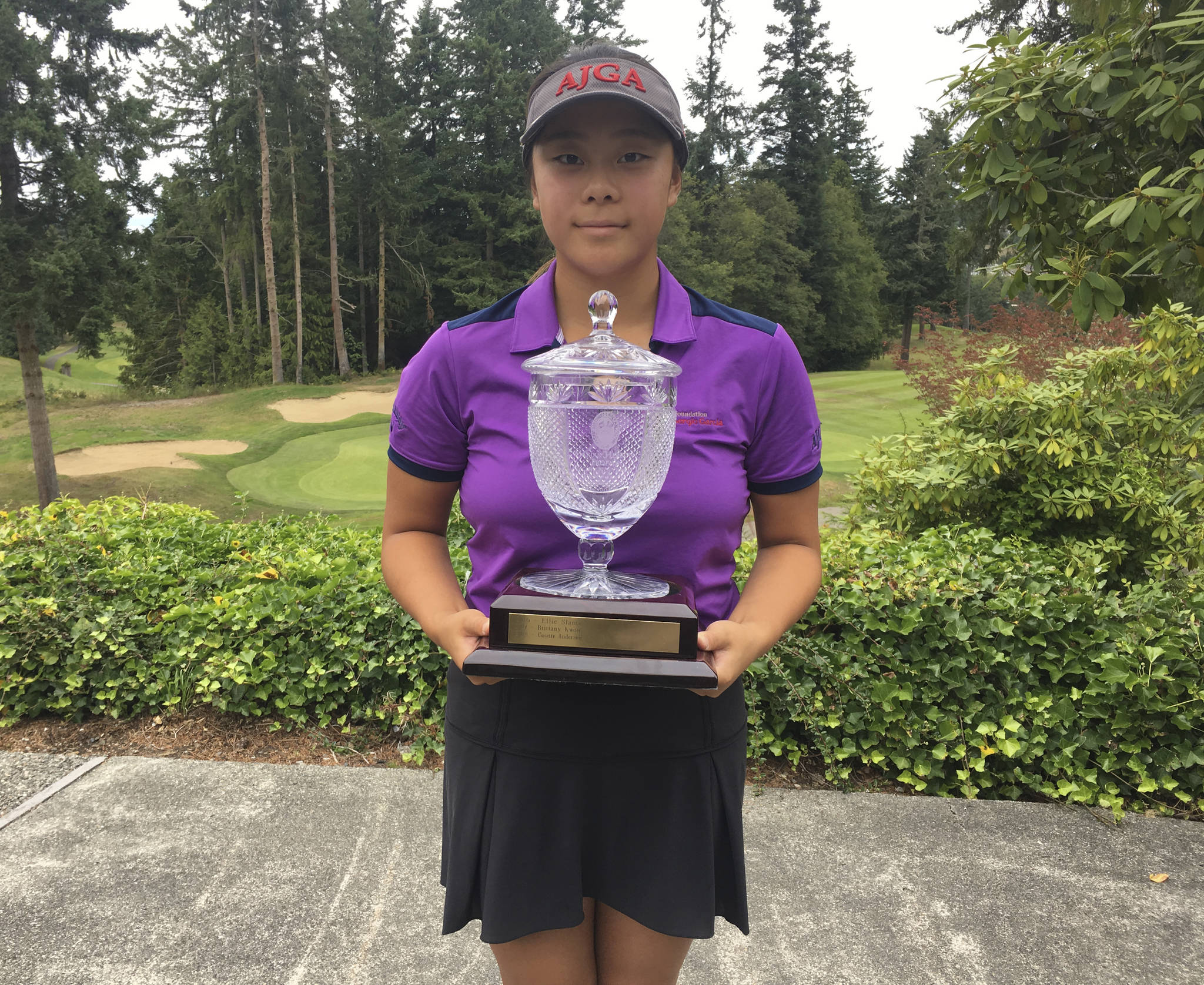 Gihoe Seo displays the trophy after winning the Pacific Northwest Golf Association Junior Girls Amateur Championship in Port Ludlow. Courtesy photo
