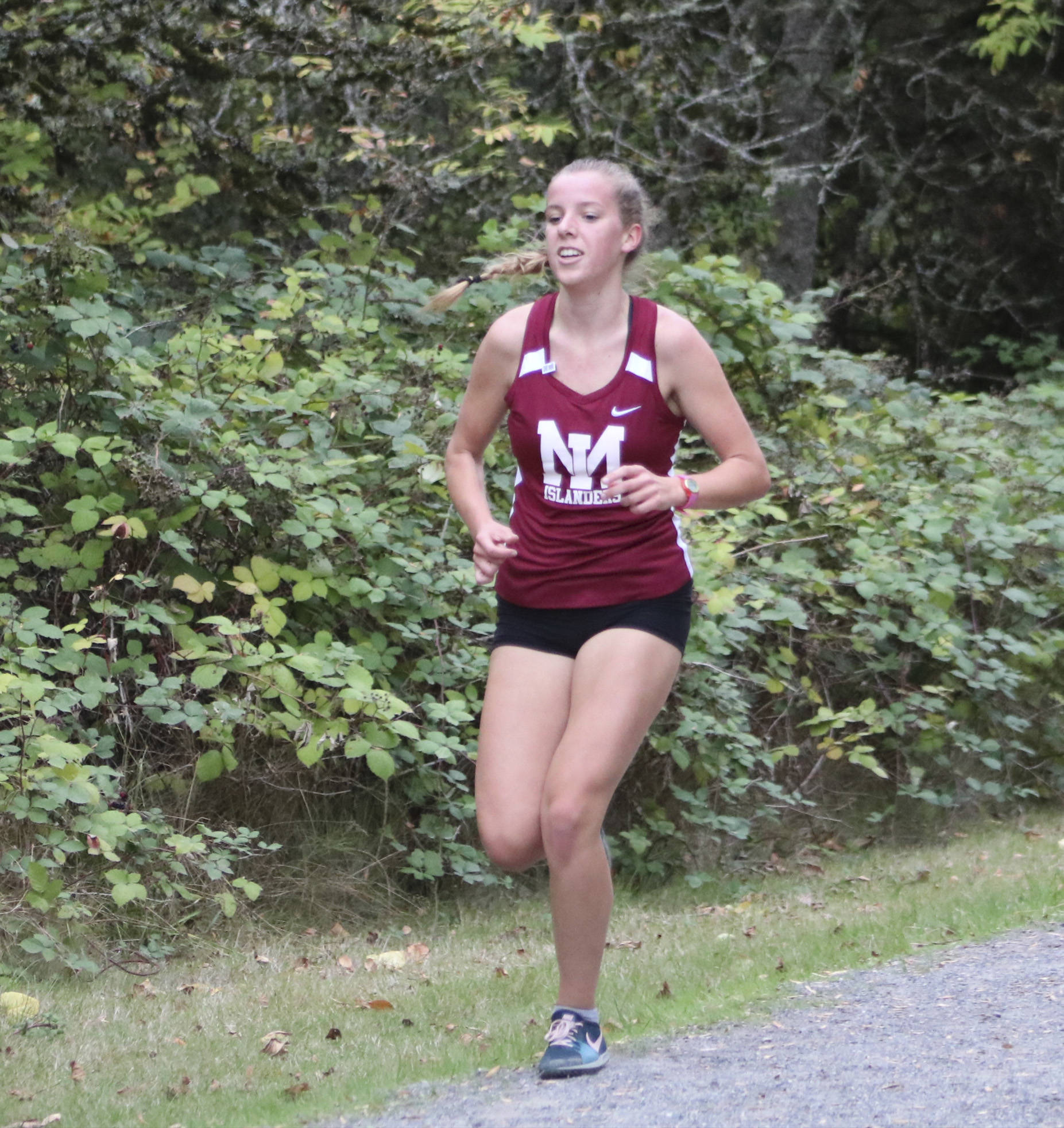 Mercer Island cross country runner Alli Hixson finished third with a time of 21:09.9 at a meet on Oct. 2. at Luther Burbank Park. Benjamin Olson/ staff photo