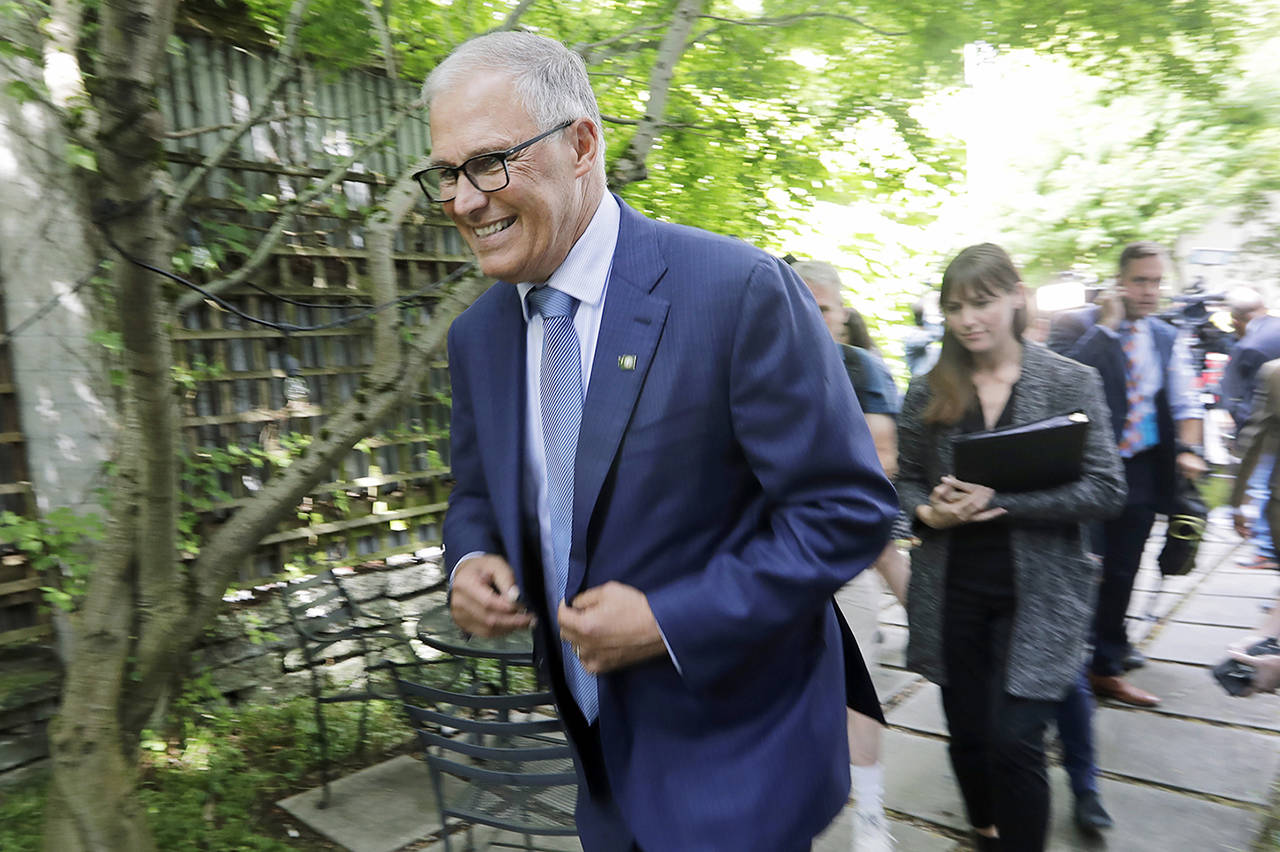 Washington Gov. Jay Inslee after speaking with reporters Aug. 22 in Seattle. (AP Photo/Elaine Thompson, File)