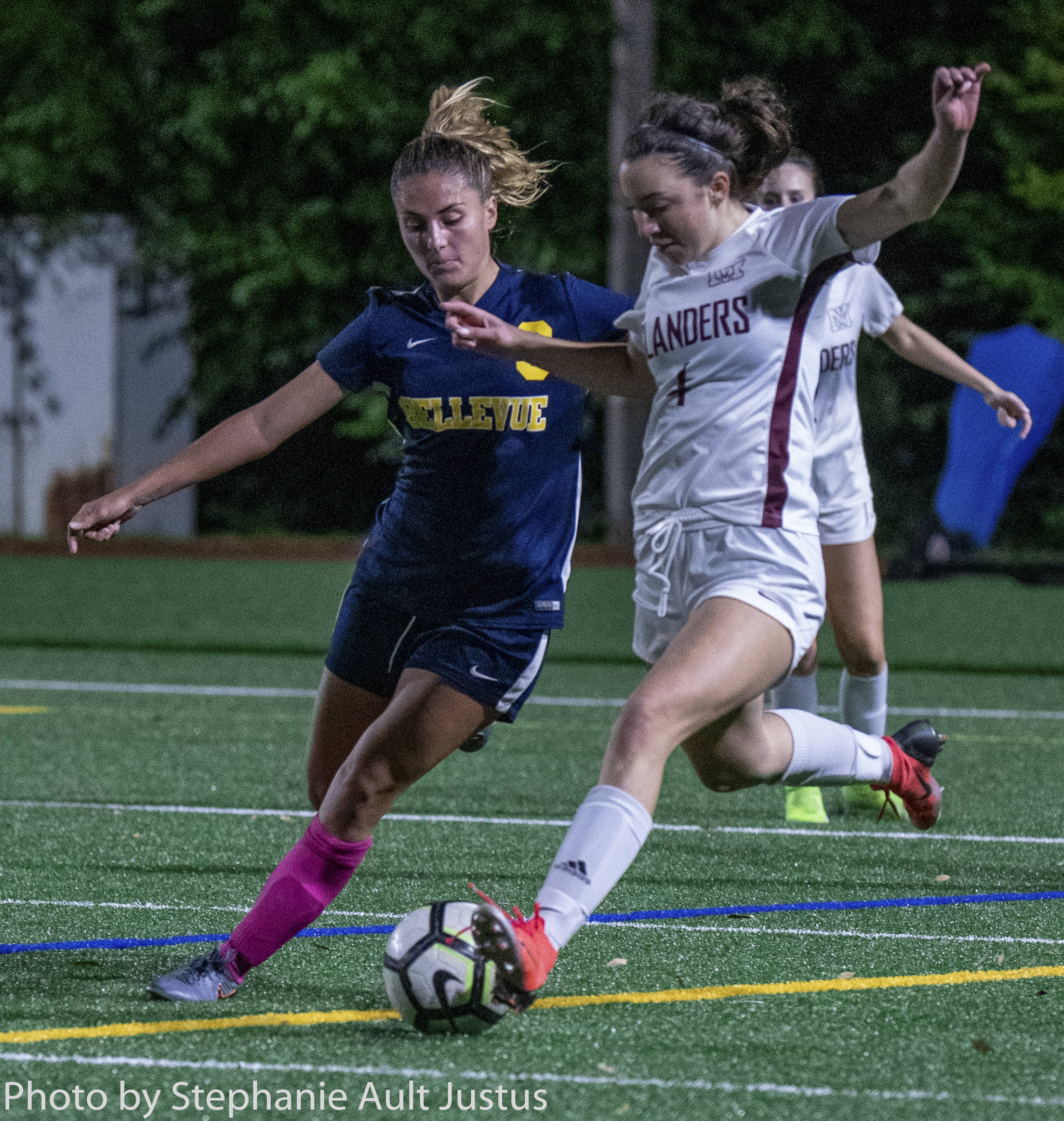 Mercer Island forward Kaija Szylko (4) winds up to kick the ball during a 1-1 tie against Bellevue on Oct. 7. Photo courtesy of Stephanie Ault Justus